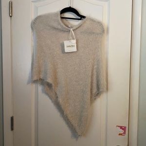 Off white asymmetrical fuzzy sweater